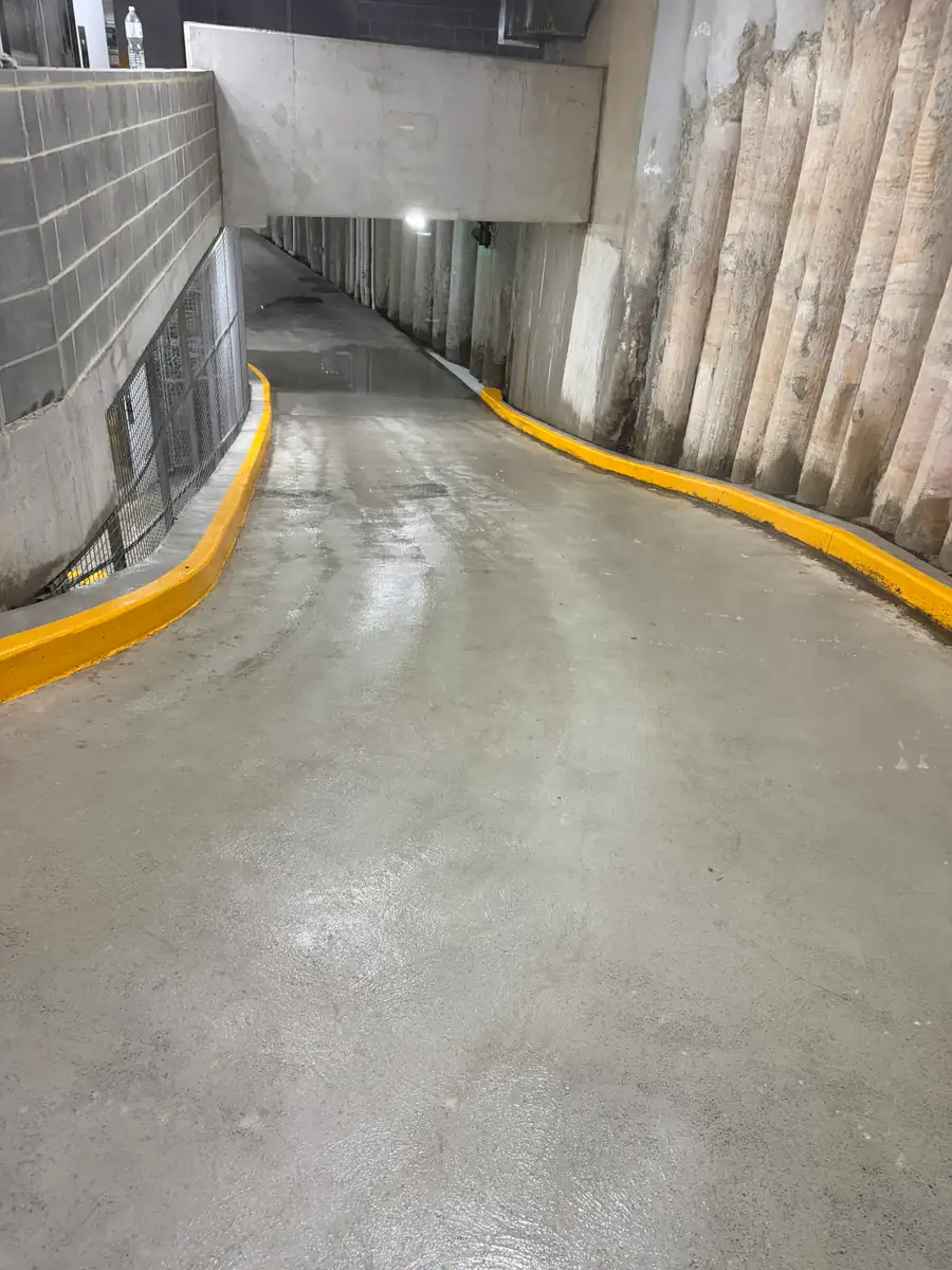 The same ramp after pressure cleaning, with the tyre marks gone