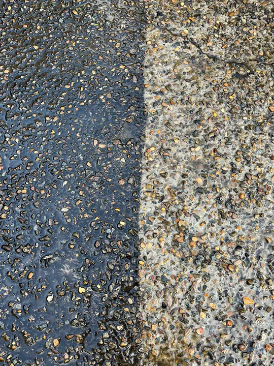 Exposed aggregate driveway before and after pressure washing